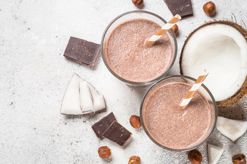Chocolate coconut hazelnut milkshake or smoothie top view.
