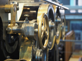 The printing press - rotary machine - polygraphic equipment. Detail of the  printing press close up.