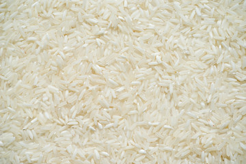 White long rice background, uncooked raw cereals