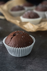 Sweet chocolate muffins with pieces of chocolate.