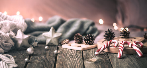 home comfort, details of the festive interior on a wooden table