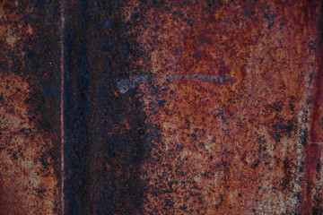 Dark worn rusty metal texture background. Iron surface rust