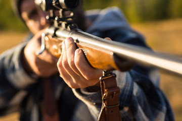 Hunter with shotgun gun on hunt. Barrel of a gun. Track down. Hunting Gear - Hunting Supplies and...