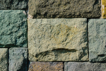 Coloured stone wall texture background material, pattern, surface