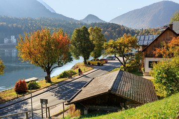 Promenade of lake Grundlsee in the early autumn morning. Village Grundlsee, Styria, Austria.