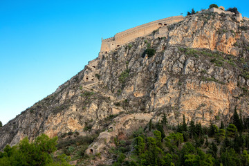 Fototapeta na wymiar Palamidi fortress on the hill, Nafplion - Greece. Walls and bastions of Palamidi fortress, Nafplio, Peloponnese, Greece - Immagine