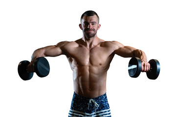 Fototapeta na wymiar young muscular man trains his shoulders with dumbbells on white background