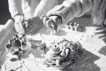 Fototapeta premium Happy family funny kids are preparing the dough, playing with flour in the kitchen