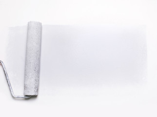 paint roller on white background. business background. photo with copy space