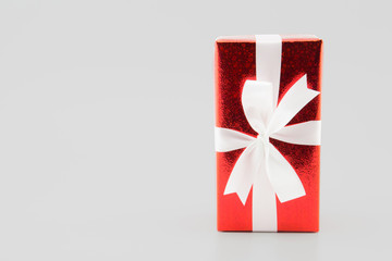 Red gift box white ribbon isolated on white background, using for christmas and new year or holiday other.