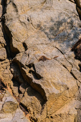 texture of the natural stone background outdoors, pattern