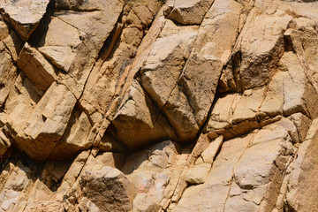 texture of the natural stone background outdoors, pattern