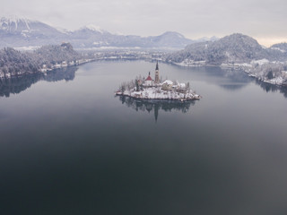 Aerial photo of Lake Bled island in cold morning winter