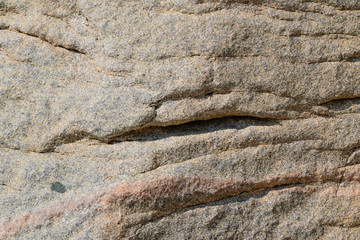 texture of the natural stone background outdoors, pattern