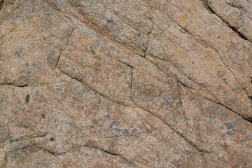 texture of the natural stone background outdoors, pattern