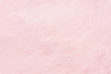Living coral color textured background, whitewashed wall with color toning