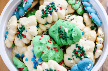 Close up view of Christmas butter spritz cookies packaged in a bucket. Homemade desserts for the...