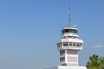 Air traffic services authority control center room in international airport under blue sky.                                                           
