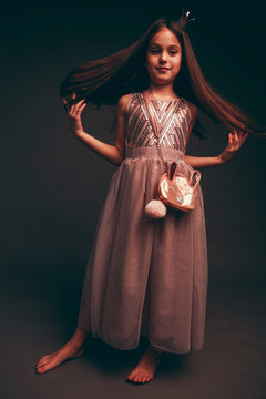 Cute little girl in beautiful dress.Little princess.cute girl in the Studio portrait photos