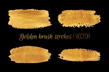 Golden paint brush strokes set. Vector design