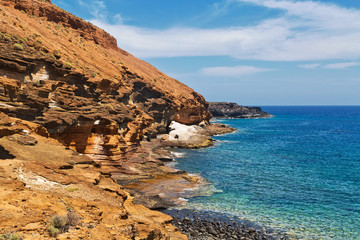 stonesl beach under blue sky