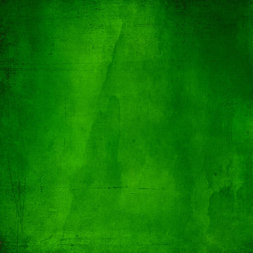Green abstract textured background with scratches