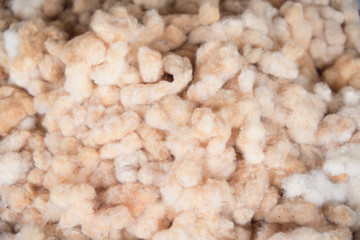 many slik from silkworm (Bombyx Mori) cocoons. This is a natural source of silk before it's processed.