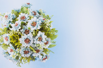Artificial flower bouquet decoration, copy space background