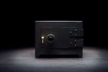 Fototapeta Steel bank safe on a dark background obraz