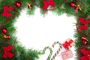 Fototapeta na wymiar Christmas frame decorated with red bows and balls isolated on white background with copy space for your text. Top view