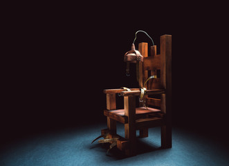 electric chair on. a dark background