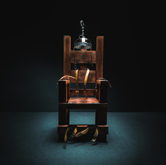 Electric chair in a dark background