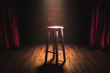 wood stool on a stage - obrazy, fototapety, plakaty