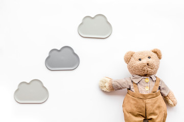 Craft toys for kids. Handmade teddy bear. White background top view