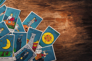 Tarot cards on a wooden background