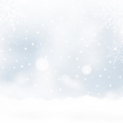 Blurred Christmas background with snowflakes and blue sky. Vector