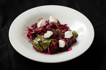 Close up salad with beet cabbage and mozzarella