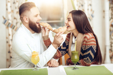 Portrait of a happy young couple in a restaurant
