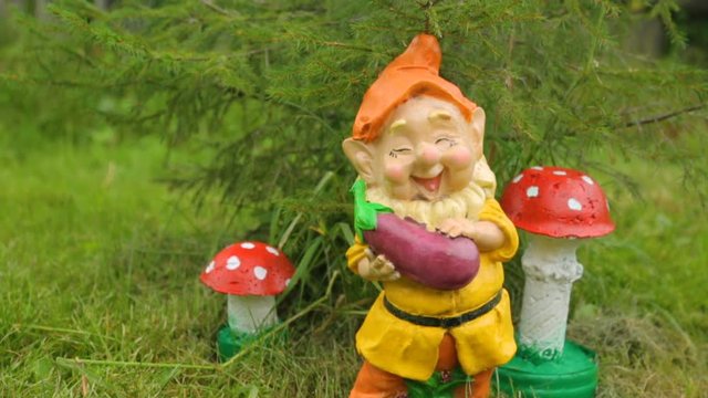 Garden decoration under a fir tree