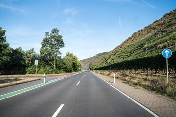 a road along the mountain