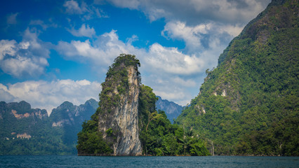 Fototapeta na wymiar Panoramic view to landscape with mountains and Cheow lan lake natural attractions in Khao Sok National Park, Surat Thani Province, Thailand.