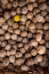 Walnuts background. Walnuts texture. Group walnuts on wooden background. Healthy organic food concept. Top view. View above
