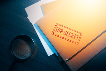 private detective desk with envelopes labeled as top secret