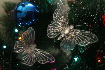 Silver butterfly on the Christmas tree 