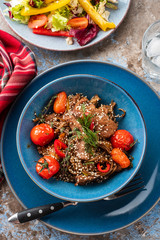 Soba noodles with beef, mushrooms, cherry tomato and sweet peppers