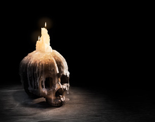 High contrast image of a skull on a table