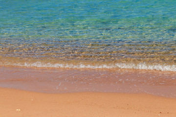 Fototapeta na wymiar Soft wave of sea on sandy beach