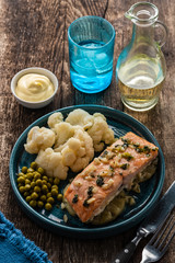 Solomon fillet with pineapple and cauliflower. Fish with vegetables.