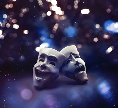 Theater masks on a stage / 3D illustration