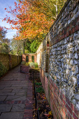 Portrait view of pedestrian path in city park . Canterbury, United Kingdom.
